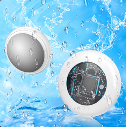 Two round electronic devices with water droplets and splashes on a blue background
